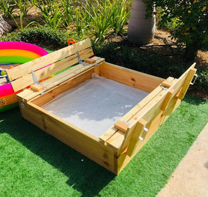 Sandpit with folding benches
